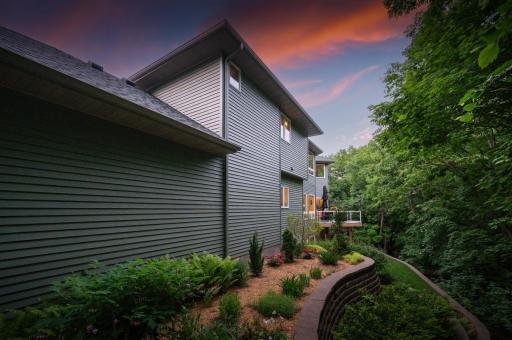 Magazine-worthy landscaping creates a stunning outdoor retreat.