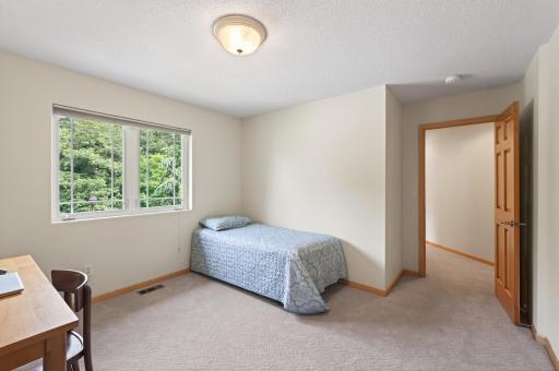 One of several rooms that could easily serve as a home office.