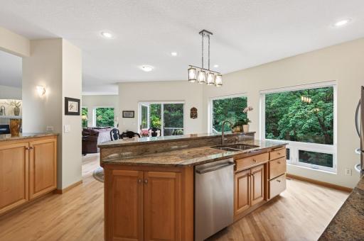 The oversized center island naturally becomes the gathering place for family and friends.