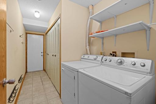 Main Floor Laundry And Mudroom Area Leads To 2 Car Garage.