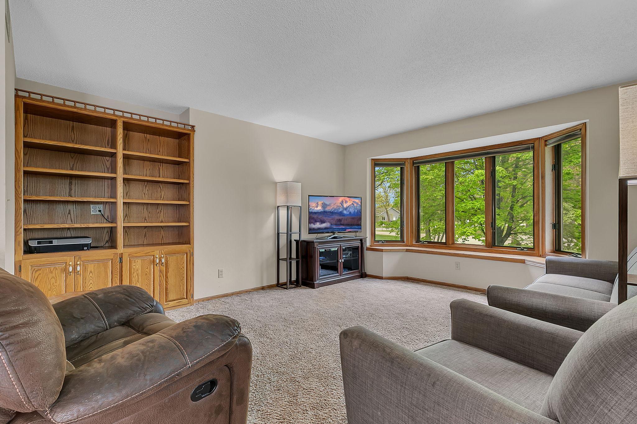 Living Room With Built-Ins and Bay Window