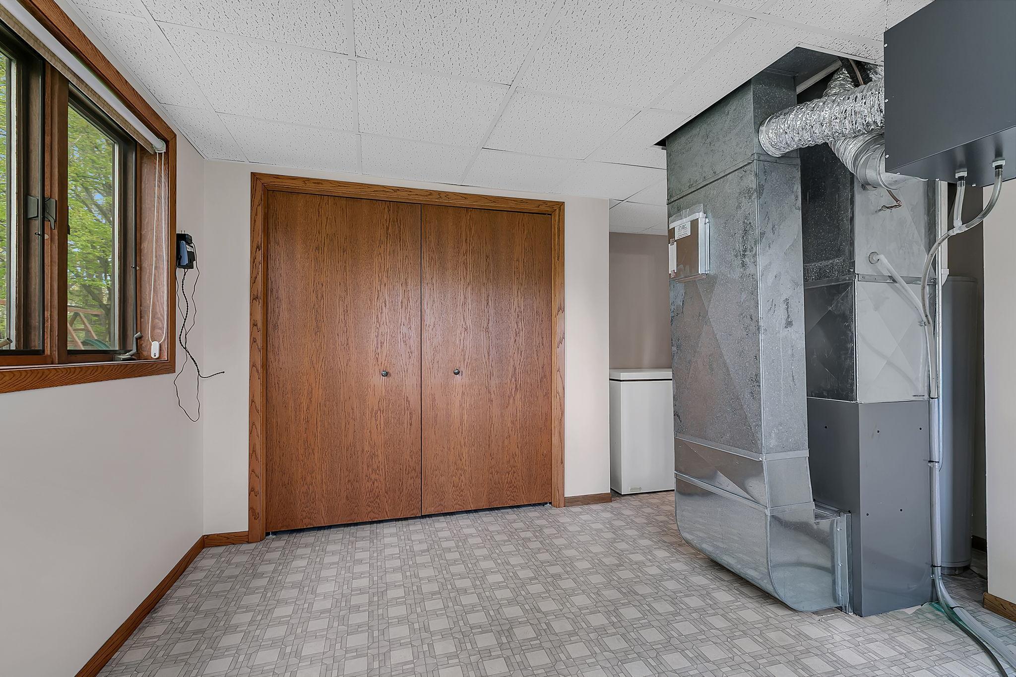 Spacious Mechanical Room With Extra Storage!