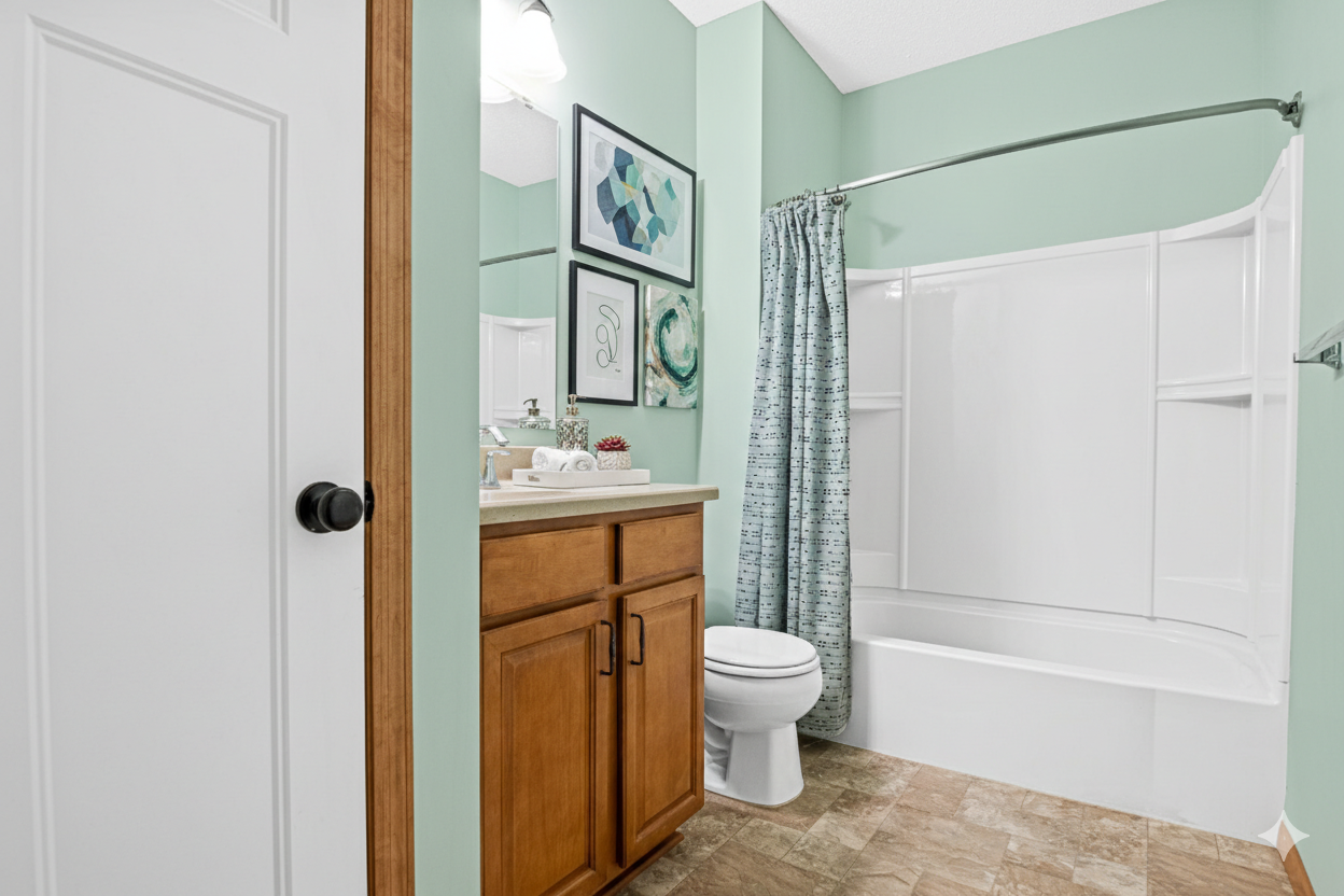 Virtually staged basement bathroom