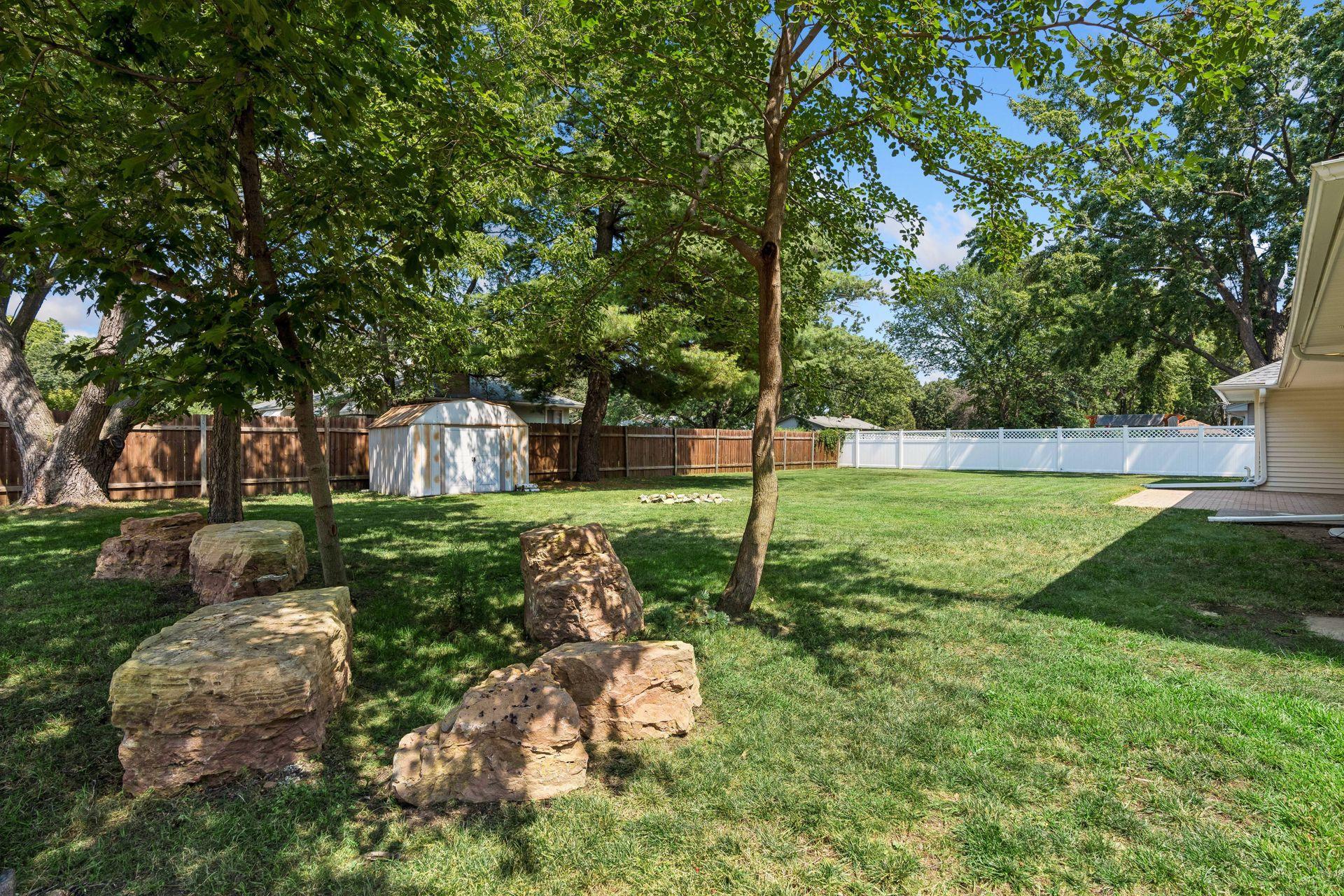 Partially fenced backyard and New Paver patio