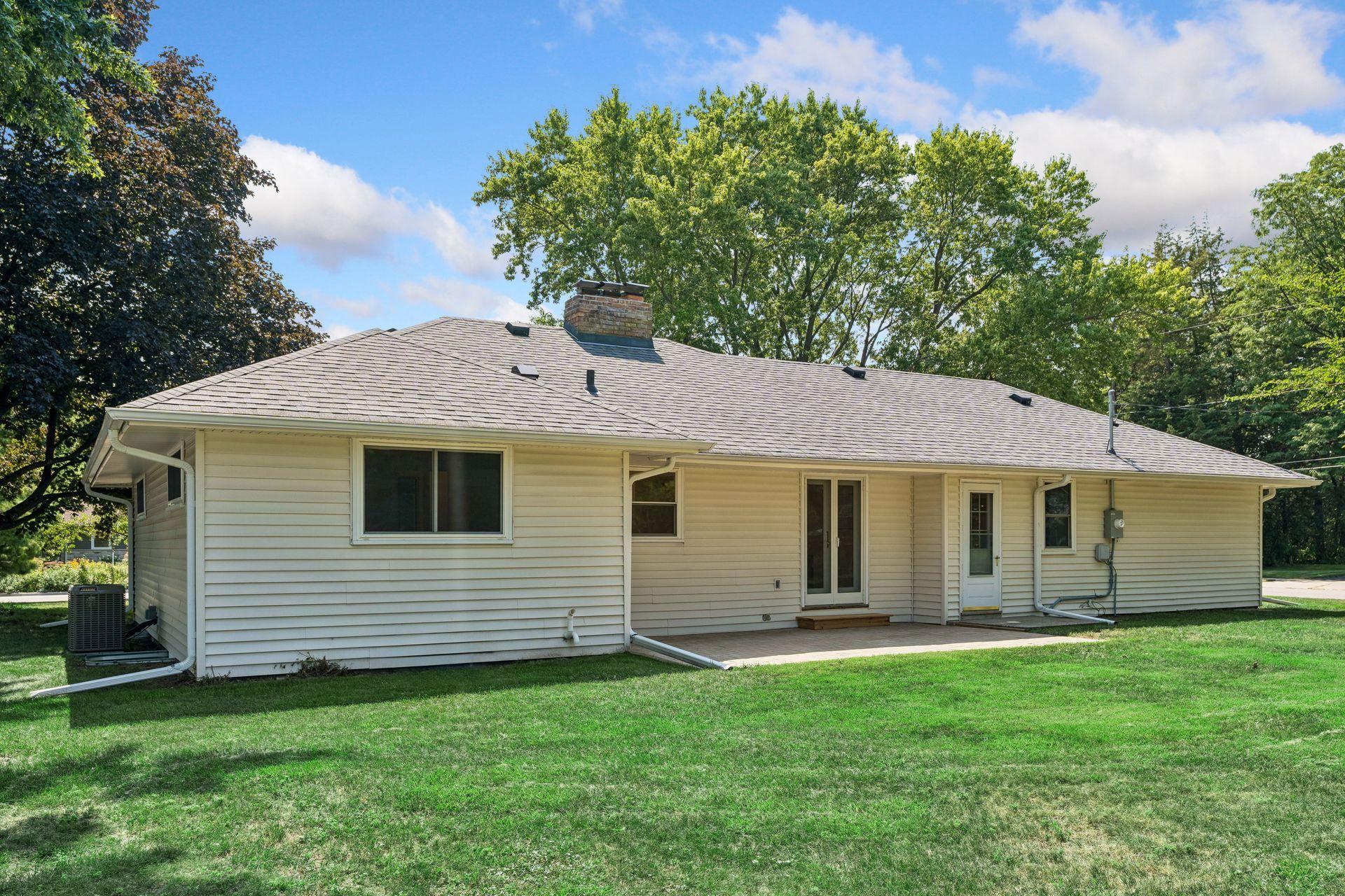 Partially fenced backyard and New Paver patio