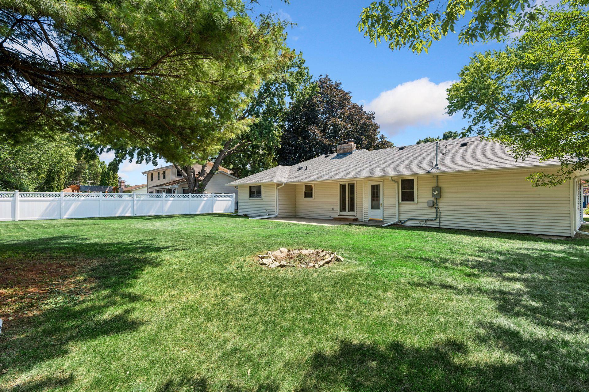 Partially fenced backyard and New Paver patio