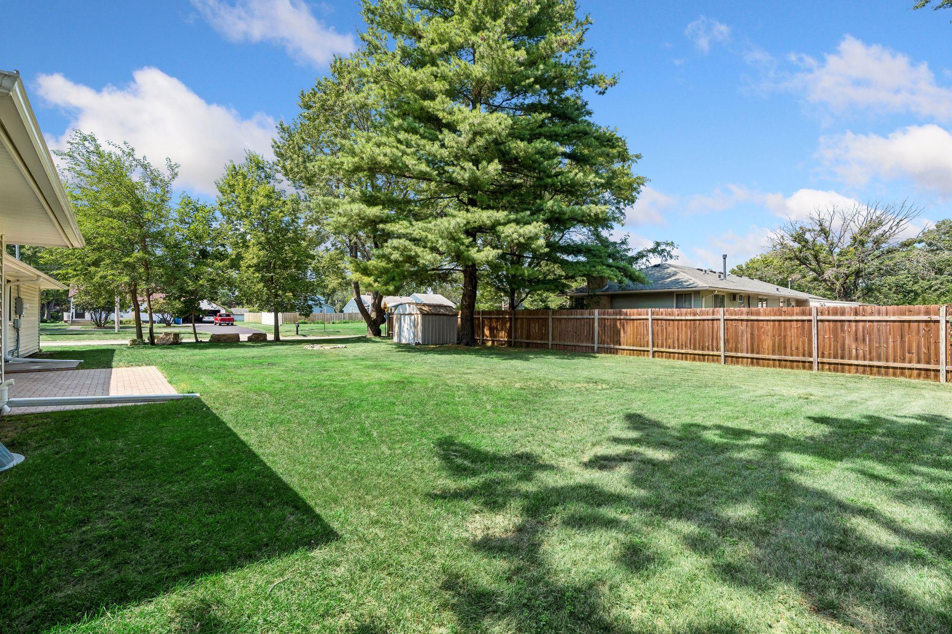 Partially fenced backyard and New Paver patio