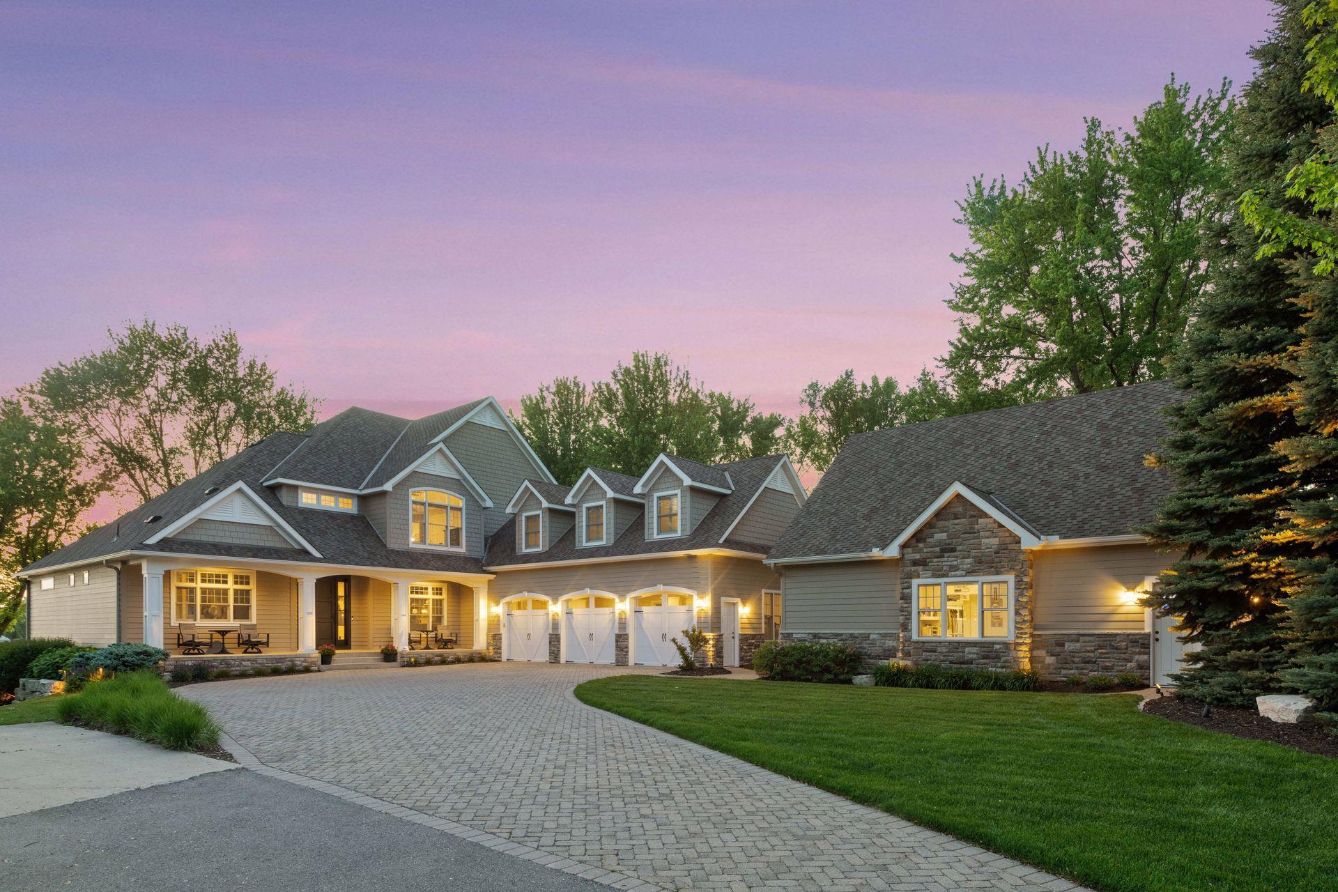 511 North Shore Drive - 6,434 sq ft Two Story, 3 stalled attached heated garage + detached 30x30 heated and AC garage.