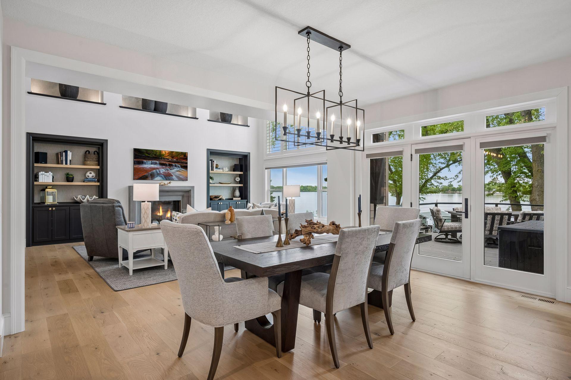 Open main floor layout from the living room, dining into the kitchen.