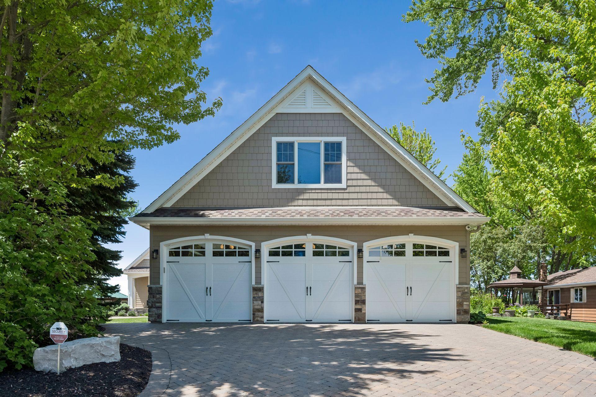 Detached 30x30 garage with heat, AC & bonus room above. (see later photos for interior)