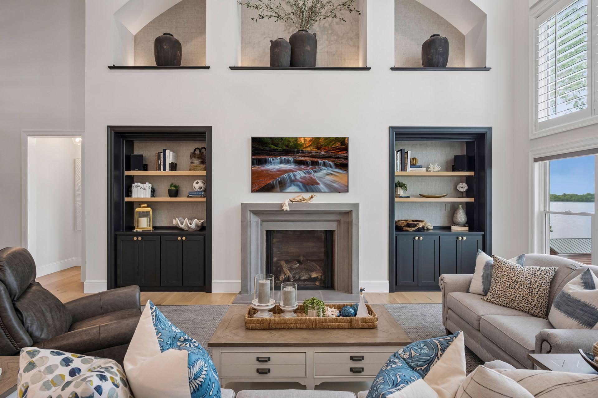 Custom built ins and stone surround gas fireplace