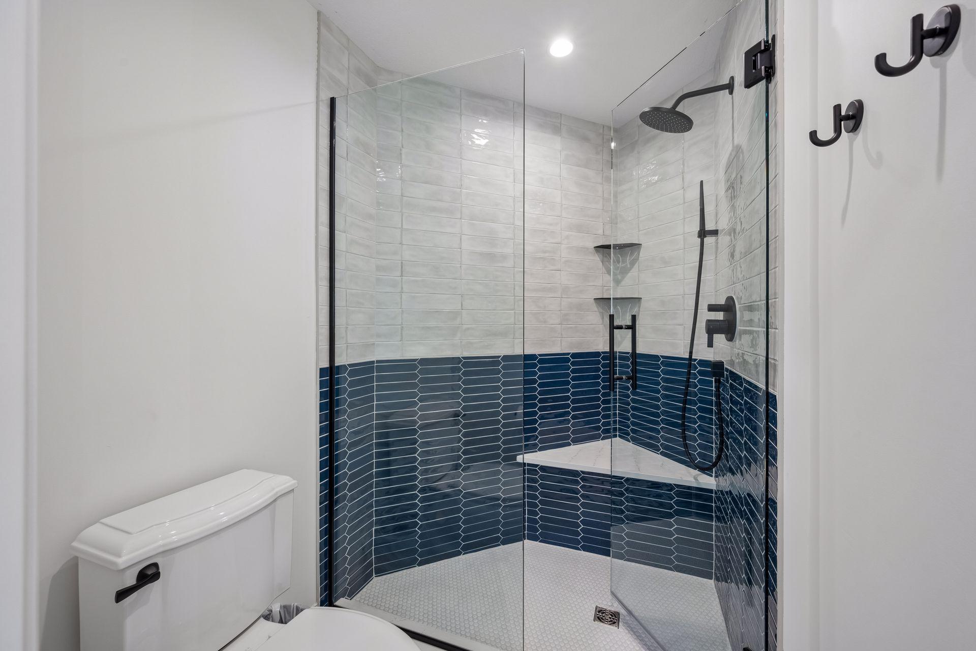 Walk in tile shower(bedroom 1) recently added with the main floor remodel in 2023