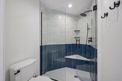 Walk in tile shower(bedroom 1) recently added with the main floor remodel in 2023