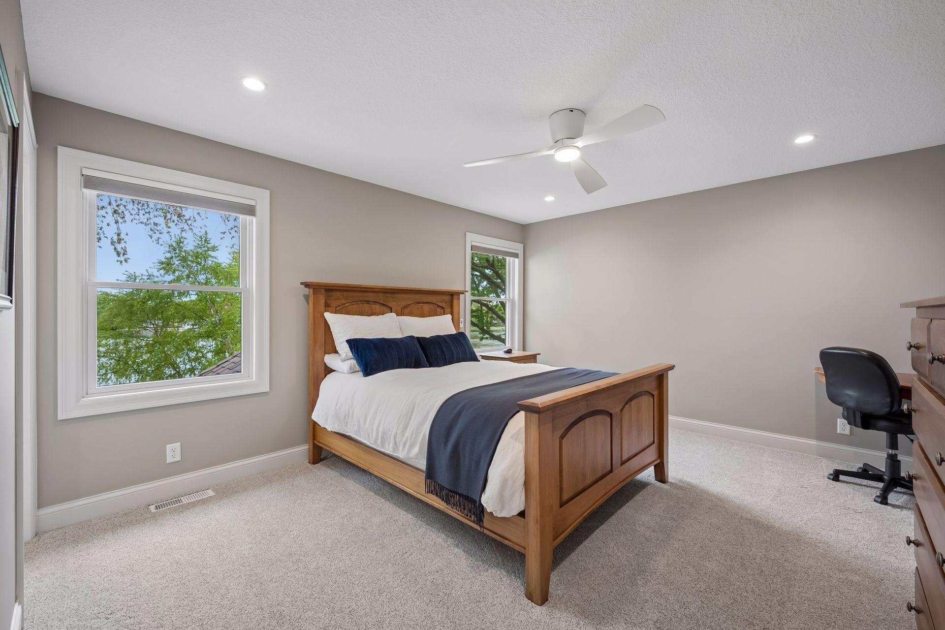 Bedroom 1 on upper level with a private en suite bathroom.