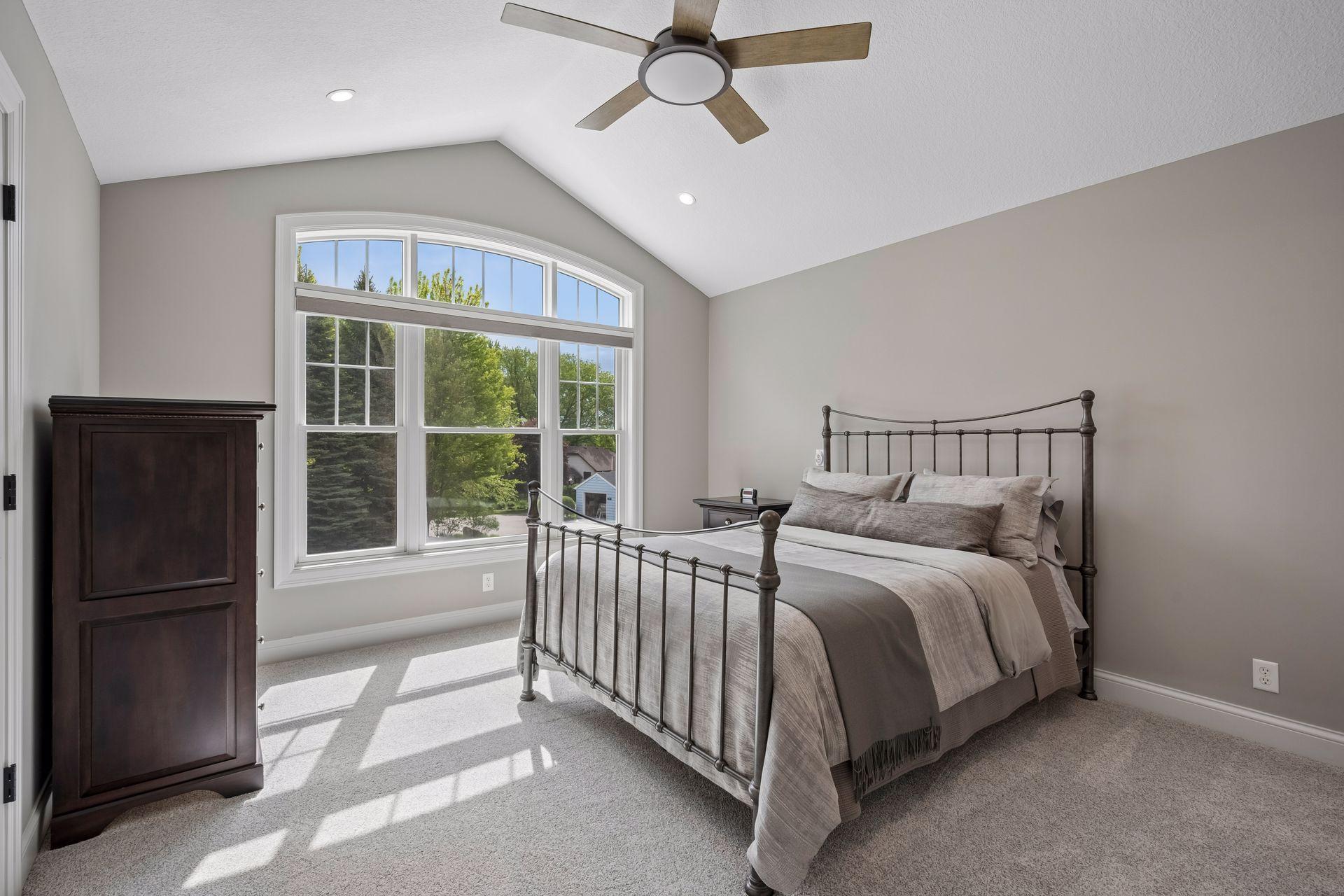 Bedroom 3 on upper level with private en suite bathroom