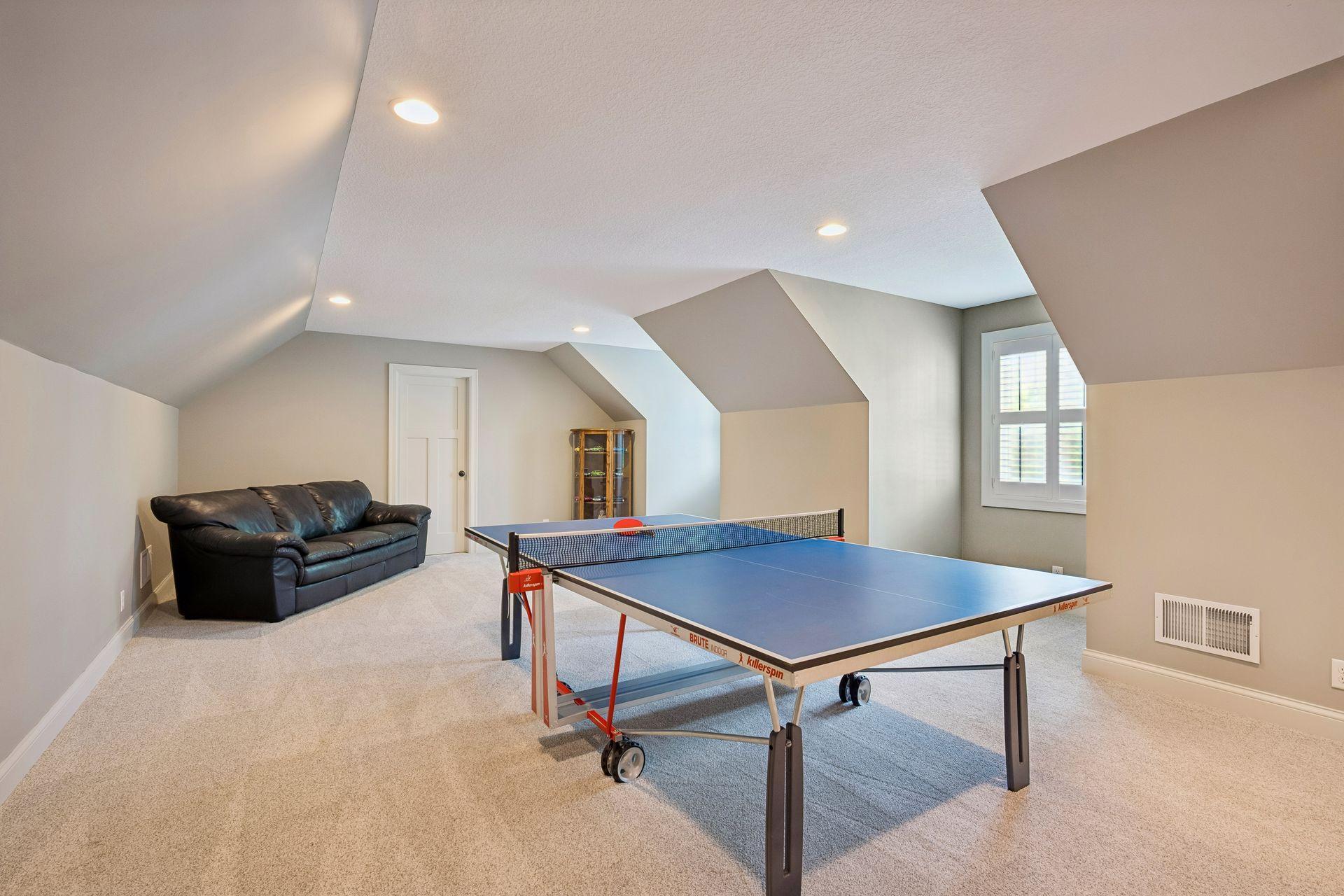 Bonus room above the garage on upper level on home. Also has a storage room on backside.