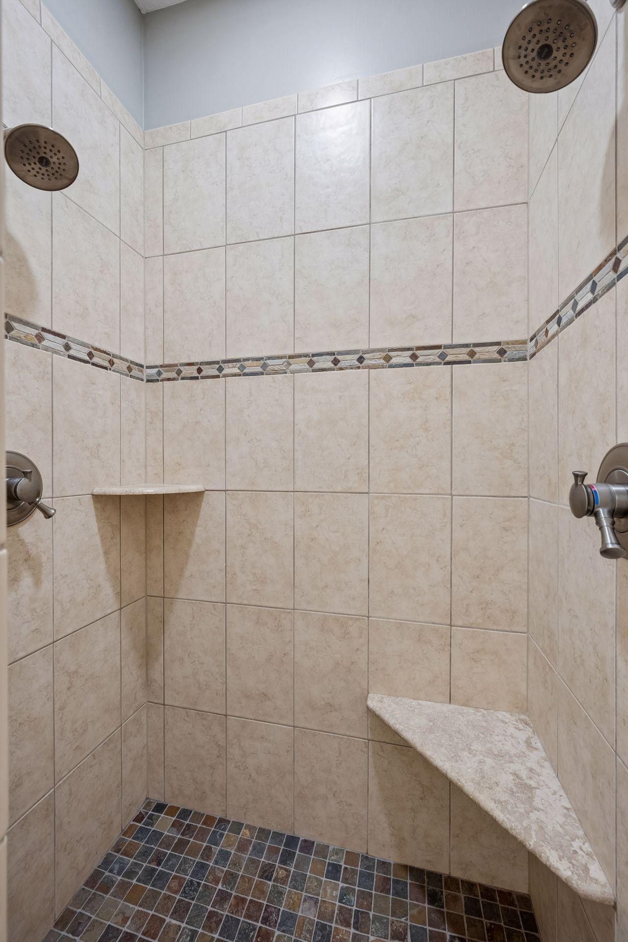 lower level shower with dual shower heads