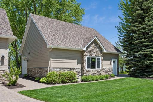 30x30 detached garage with heat & AC. epoxy floors, 1/2 bathroom and bonus space above.