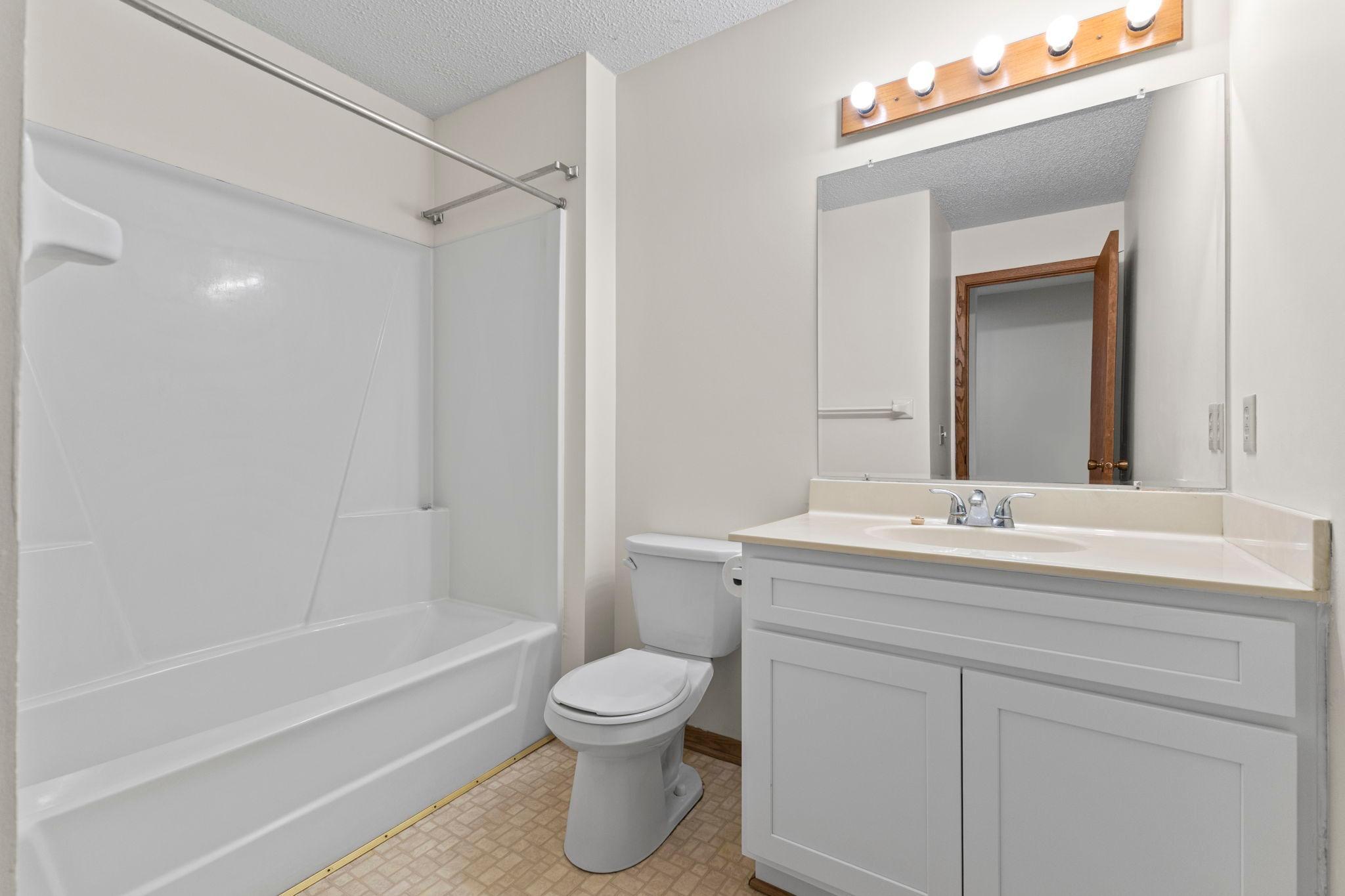 Full bath with new vanity