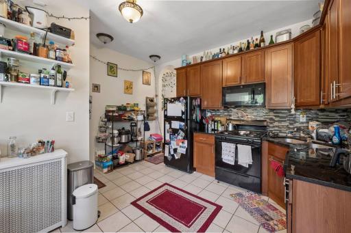Large updated kitchen/tiled floor and backsplash