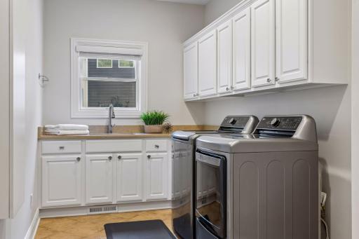 Additional updates include heated floors in the laundry room.