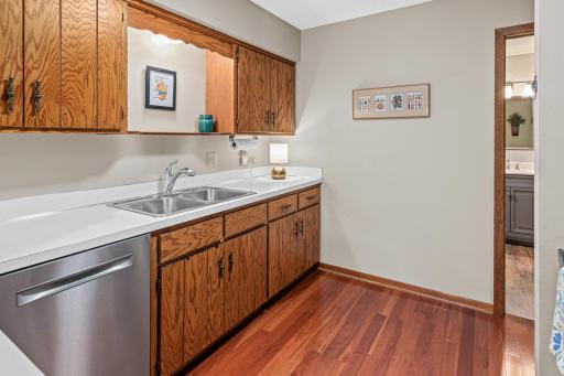 Meticulously maintained kitchen with beautiful stainless steel appliances.