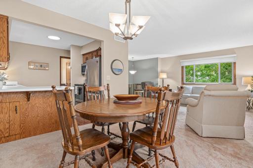 The informal dining area sits between the living room and kitchen, creating an ideal setting for casual meals or gathering with guests. Located near the deck- this space is great for entertaining.