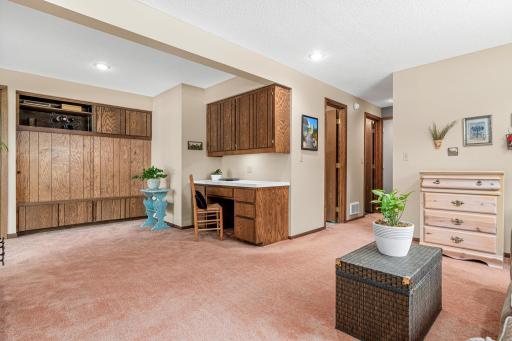 The lower level allows for another space to gather. Easy walk out patio doors to the patio. If needed, a second bedroom could easily be added in the office space.