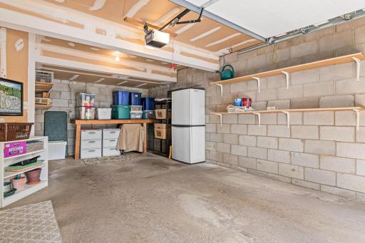 Single stall garage that offers a great storage space as well.