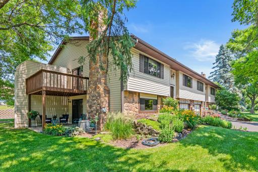 Beautiful landscaping and shade from the mature trees make this a perfect space to enjoy the outdoors.