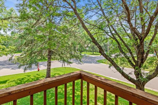 Enjoy views of your corner lot and private deck, an ideal place to enjoy your morning coffee or for unwinding after a long day. Martha Lake is in the distance- easier to see in winter months.