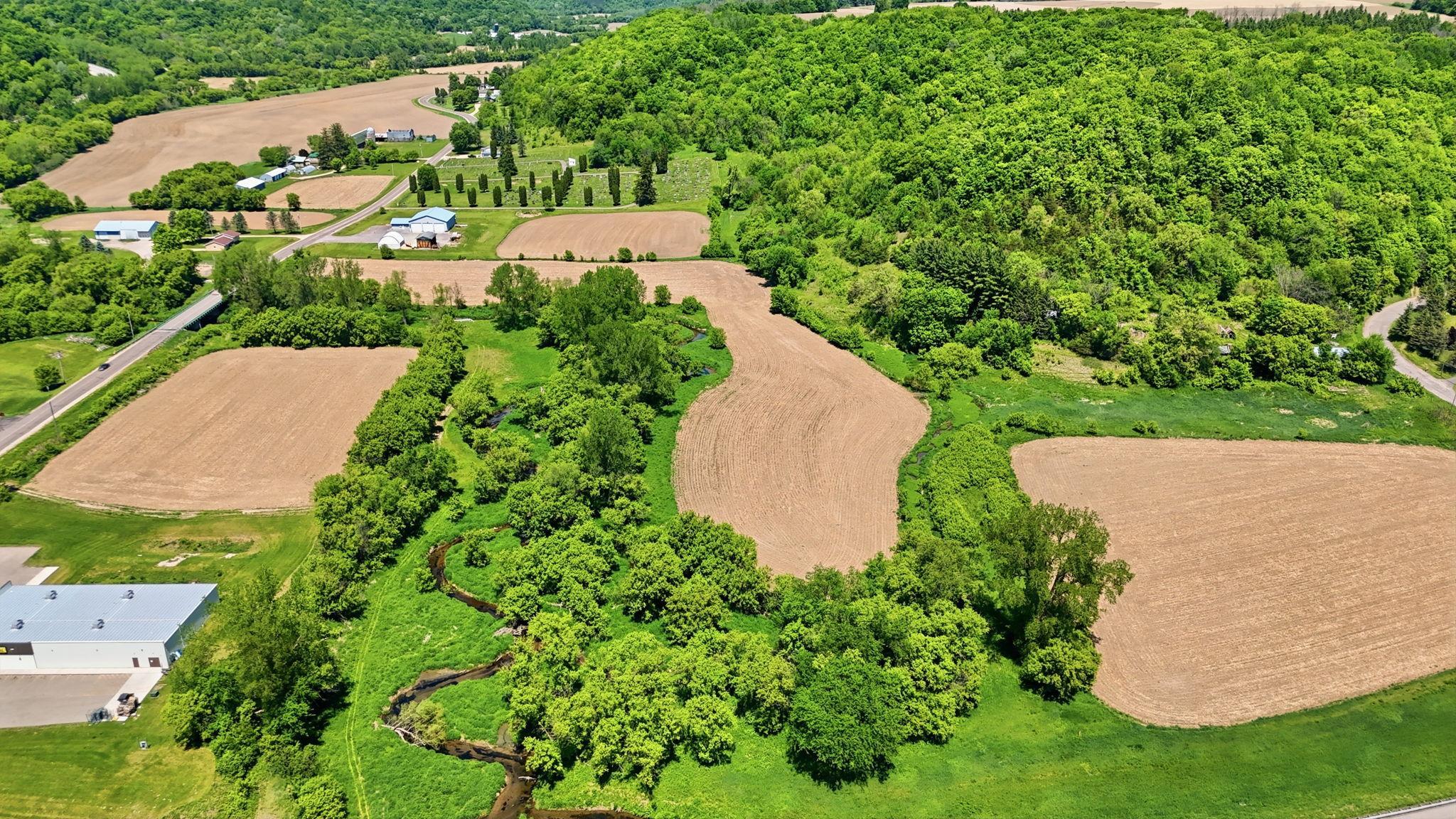 Winding Plum Creek runs through the property