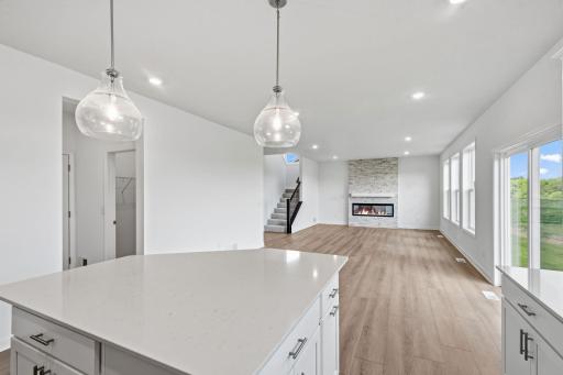 The center island overlooks the rest of the home in an ideal set-up for everyday living