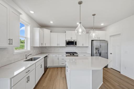 The kitchen naturally operates as the heart of this home, offering ample countertop space and brand-new appliances that will inspire attempts at new recipes.