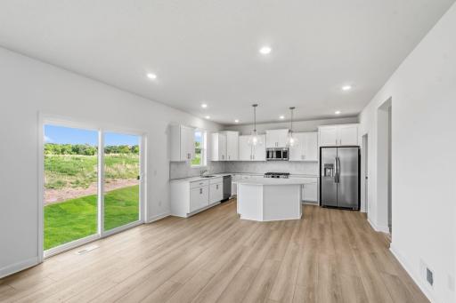 Enjoy meals of any kind in the dining room, situated among the open floorplan for effortless flow between cooking, dining and relaxing.