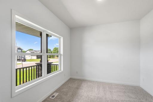 A first-floor office is situated just off the entry, ideal for working remotely or getting paperwork done.