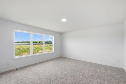The ownerâs suite is found on the second floor, complete with a cozy bedroom, an en-suite bathroom and a walk-in closet.