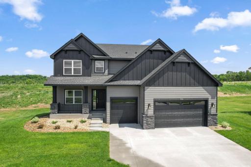 Welcome to 911 Milborne LN NW! (All photos are of the actual model home.)