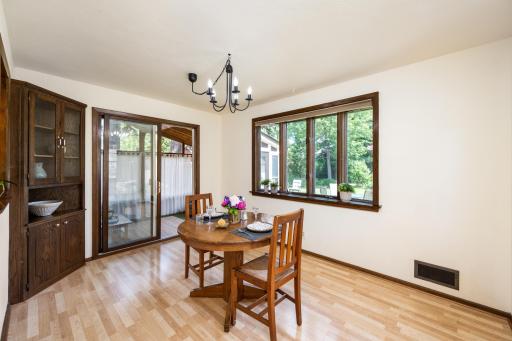 Dining room w/ patio door to 3 season porch