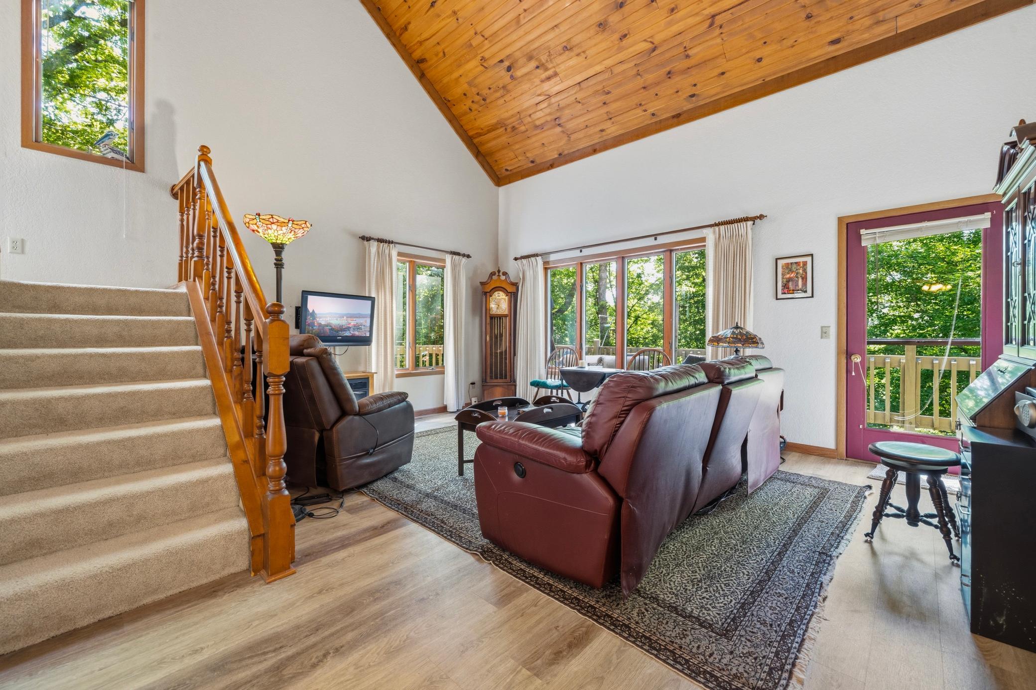 Living Room with Beautiful Wood Vaulted Ceilings