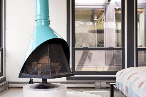 Iconic Malm fireplace in the primary bedroom