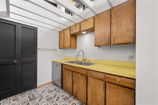Retro-inspired kitchen with original cabinetry and countertops