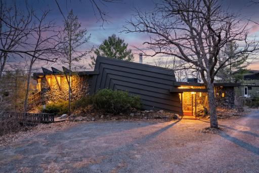 Architect-designed by Arthur Svendsen, offering a rare, site-driven layout that blends seamlessly into its natural surroundings