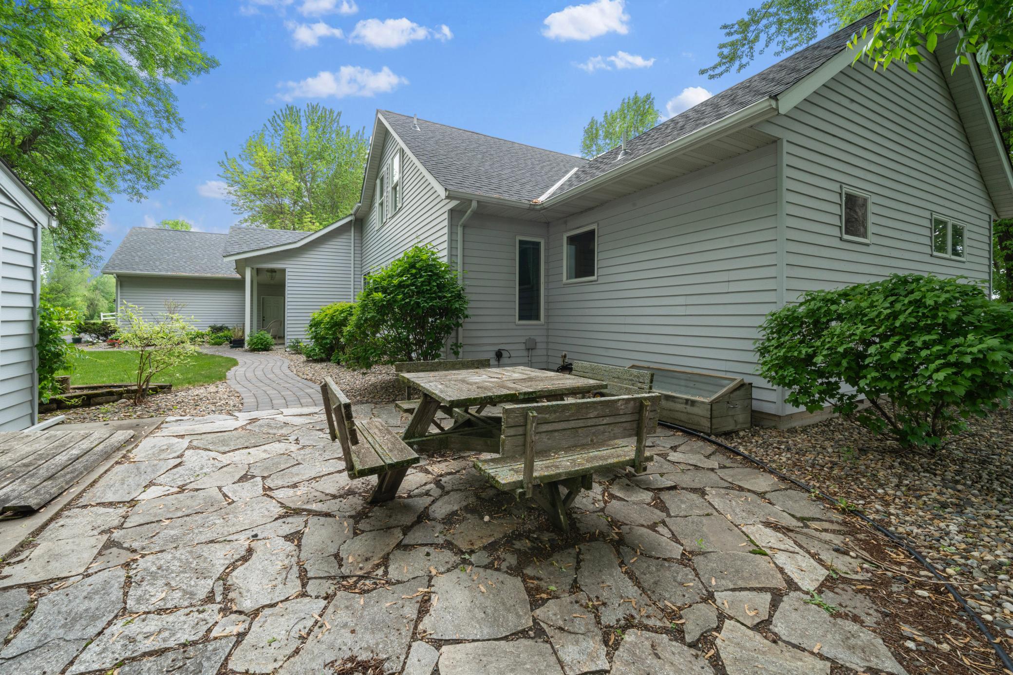 Relax and enjoy the patio at the front of the home.