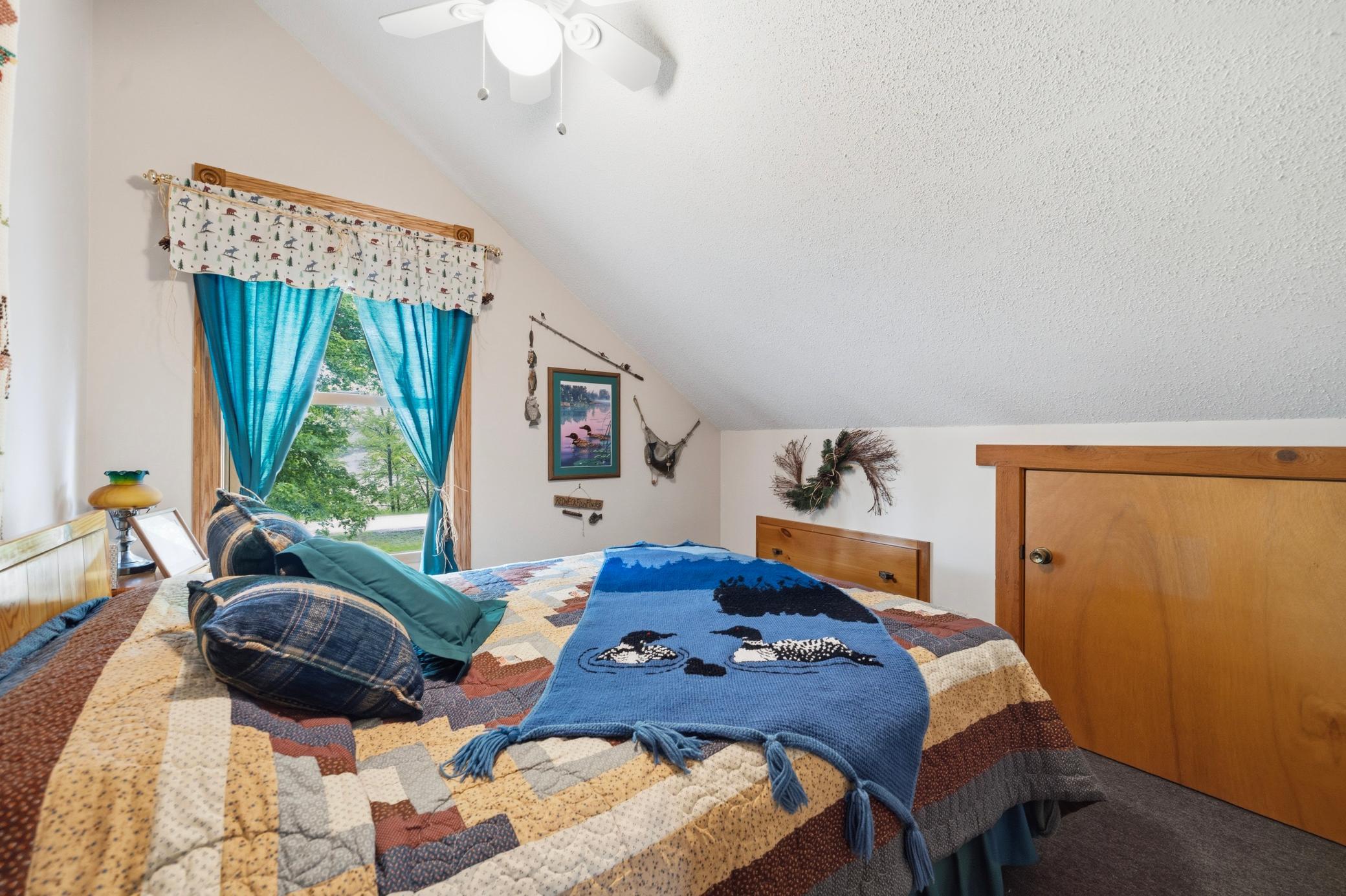 Fifth bedroom, located on the upper level.