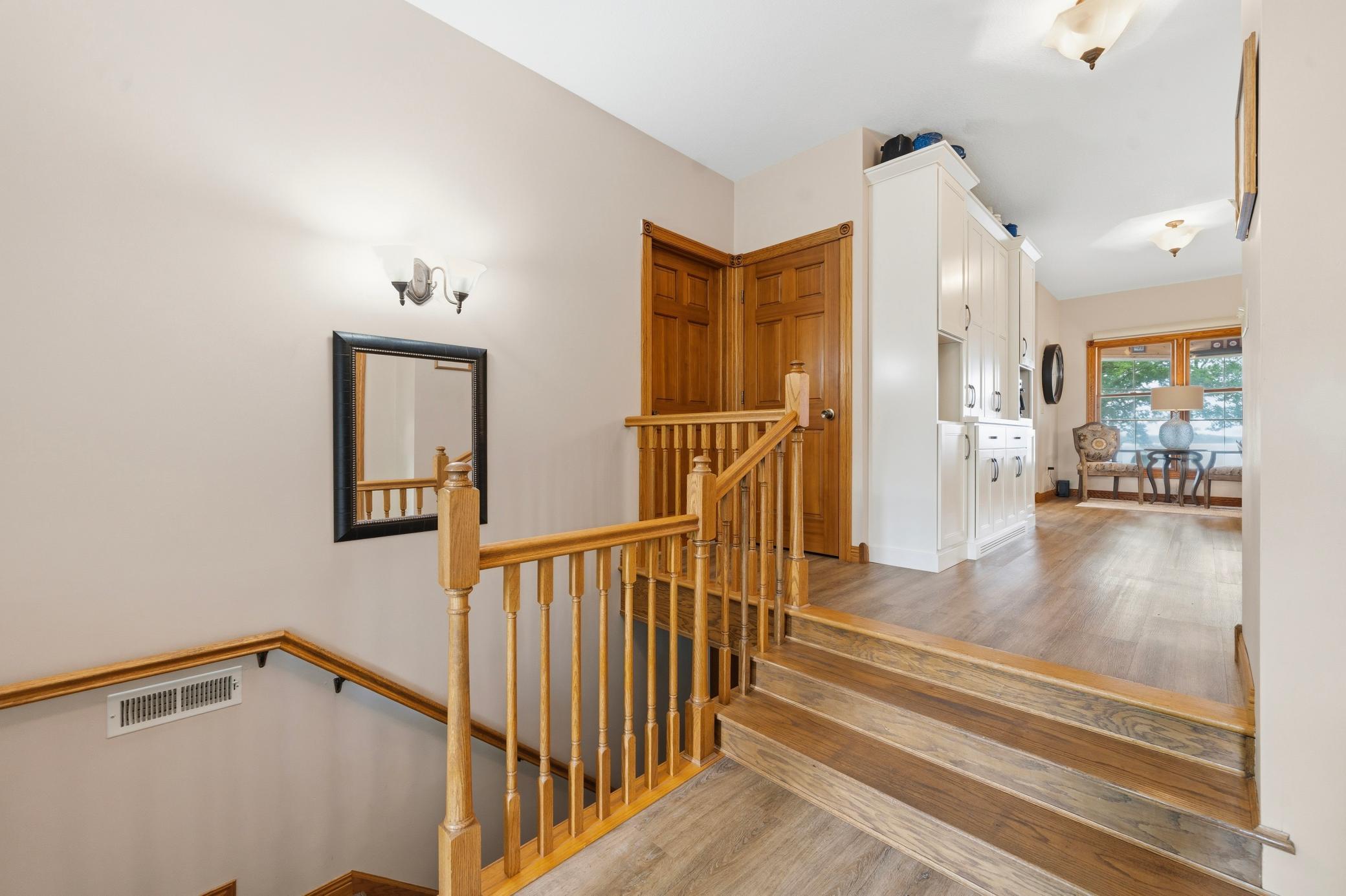 The impressive style of this home begins with neutral tones and gleaming hard surface floors.