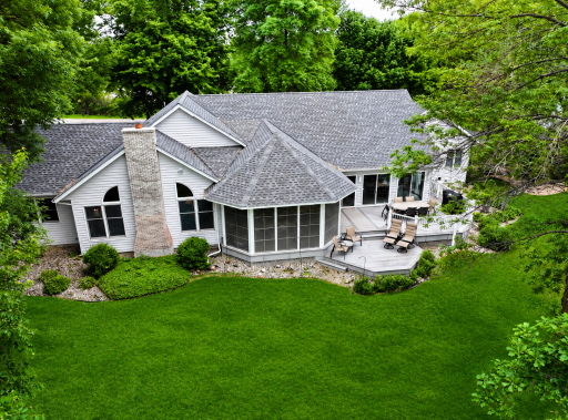 The incredible backyard boasts a maintenance-free deck overlooking abundant green space and spectacular lake views.