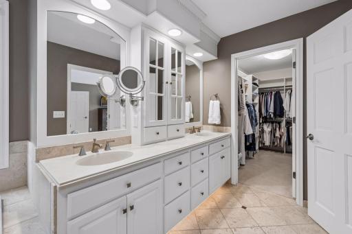 Thoughtfully designed for everyday comfort, the ensuite bath features dual vanities, abundant storage, and a generous walk-in closet that creates the feel of a private dressing room.