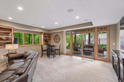 Whether you're hosting game night or cheering on your favorite team, this spacious walkout level easily brings everyone together before flowing seamlessly to the paver patio beyond.