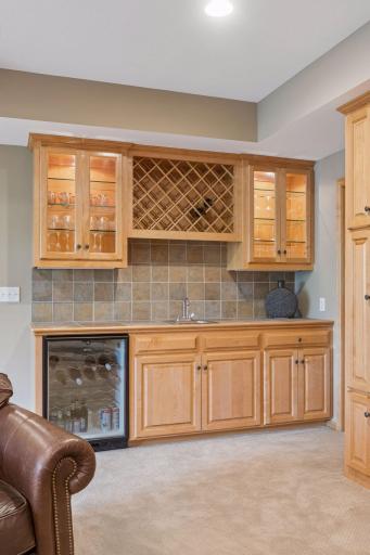 Complete with a wet bar and beverage refrigerator, this level was designed for effortless entertaining, keeping snacks, drinks, and conversation all within easy reach.